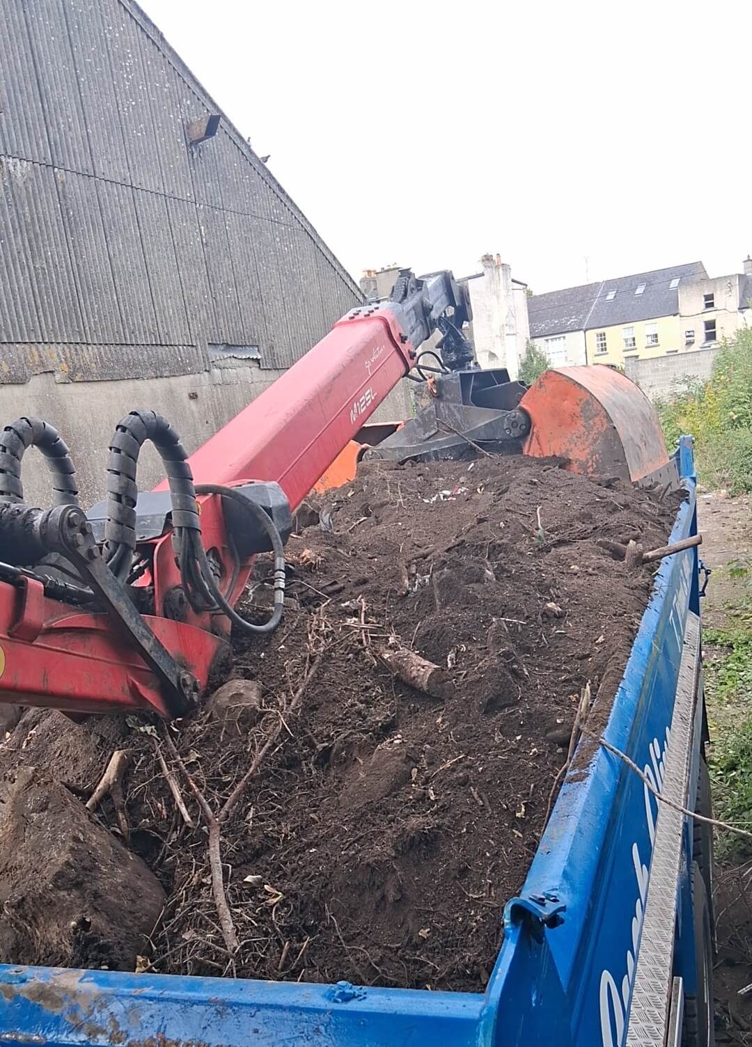 loading dirt in truck